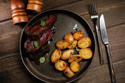 Brisket with mini potatoes and chipotle sauce